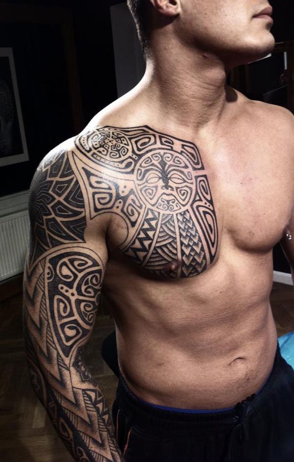 tribal-chest-sleeve-tattoo