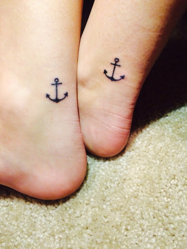Anchor tattoos on both Ankles