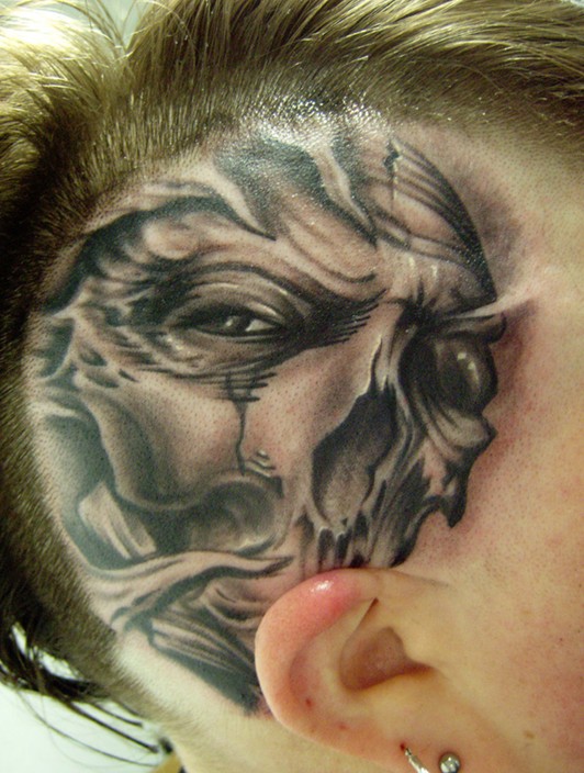 Freehand-skull-on-head-tattoo