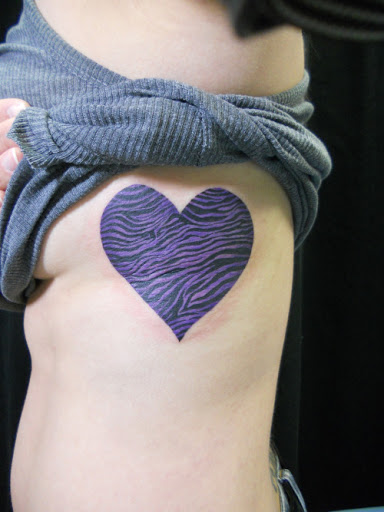 Heart Tattoo designs on rib cage ideas for girls