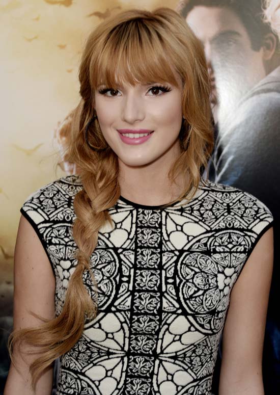 Loose-Side-Braid-with-Straight-Fringes-and-Curly-Bangs