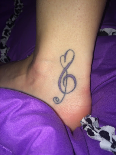 Music note with heart tattoo designs