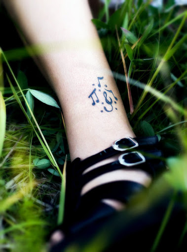 Music notes are very famous tattoo designs for men and women