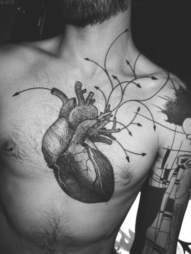 Traditional human heart tattoos designs ideas for men on chest