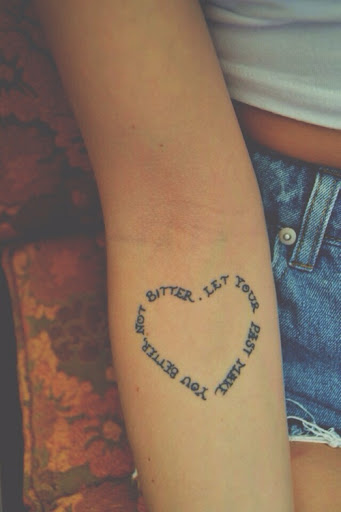 Very beautiful quote in heart tattoo form giving a positive meaning