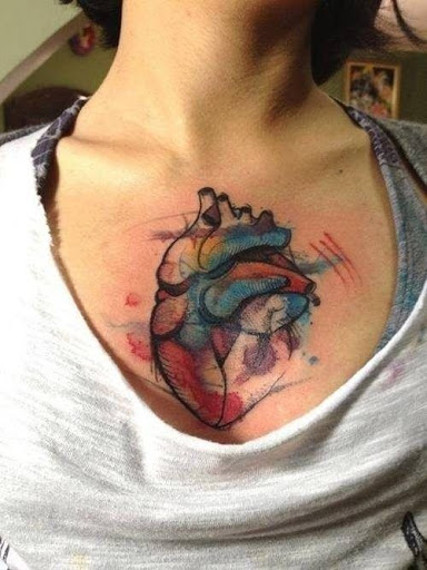 Watercolor heart tattoos designs on chest for men and women