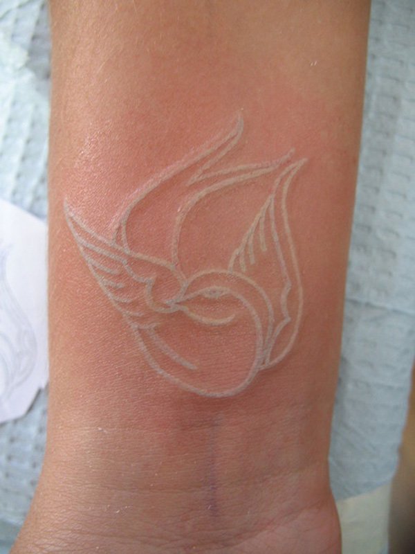 White-ink-Bird-tattoo