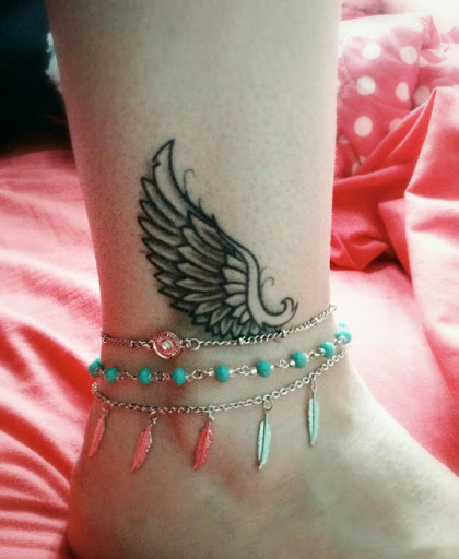 Wing tattoo designs on Ankle