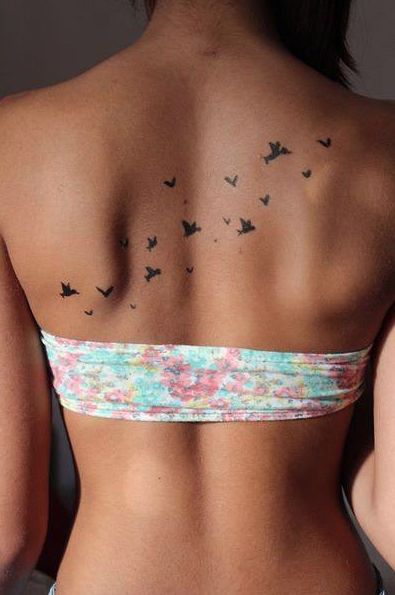 Classy Upper Back Tattoos for Women