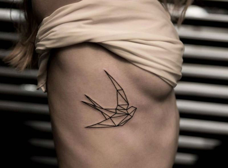 Minimalistc and geometrical ribs tattoo