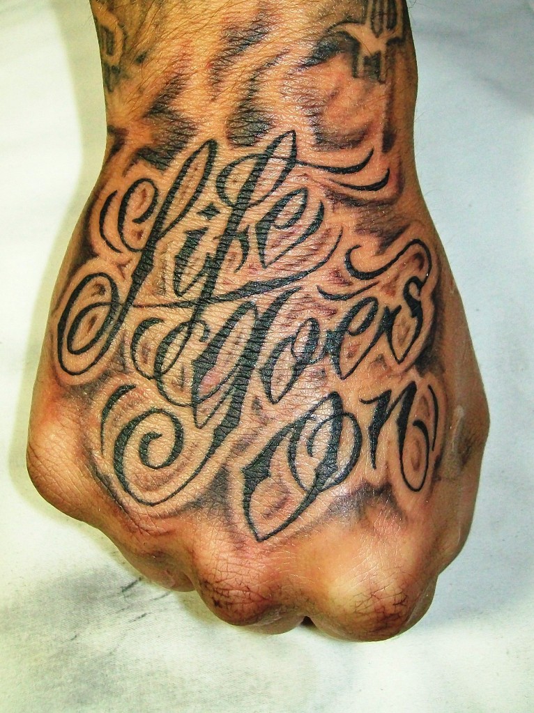 life_goes_on_hand_tattoo